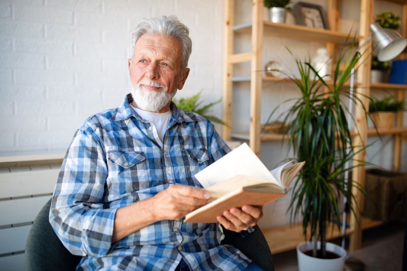 Man Smiling Because He Invested In Deferred Annuities At An Earlier Age