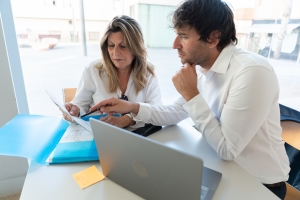 Financial Advisor Explaining MYGA to A Middle Aged Woman