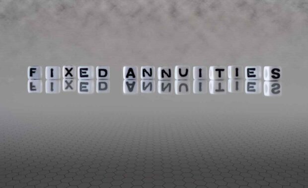 Fixed Annuities Word Represented by Black and White Letter Cubes