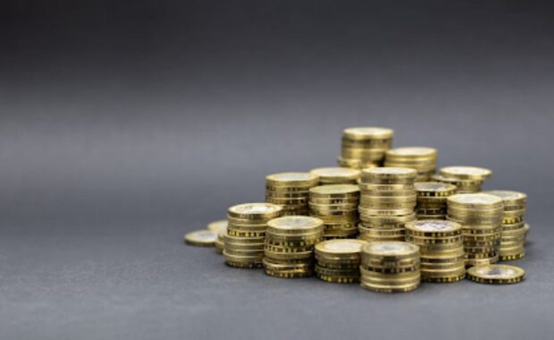 Stacks of Gold Coins with Dark Background