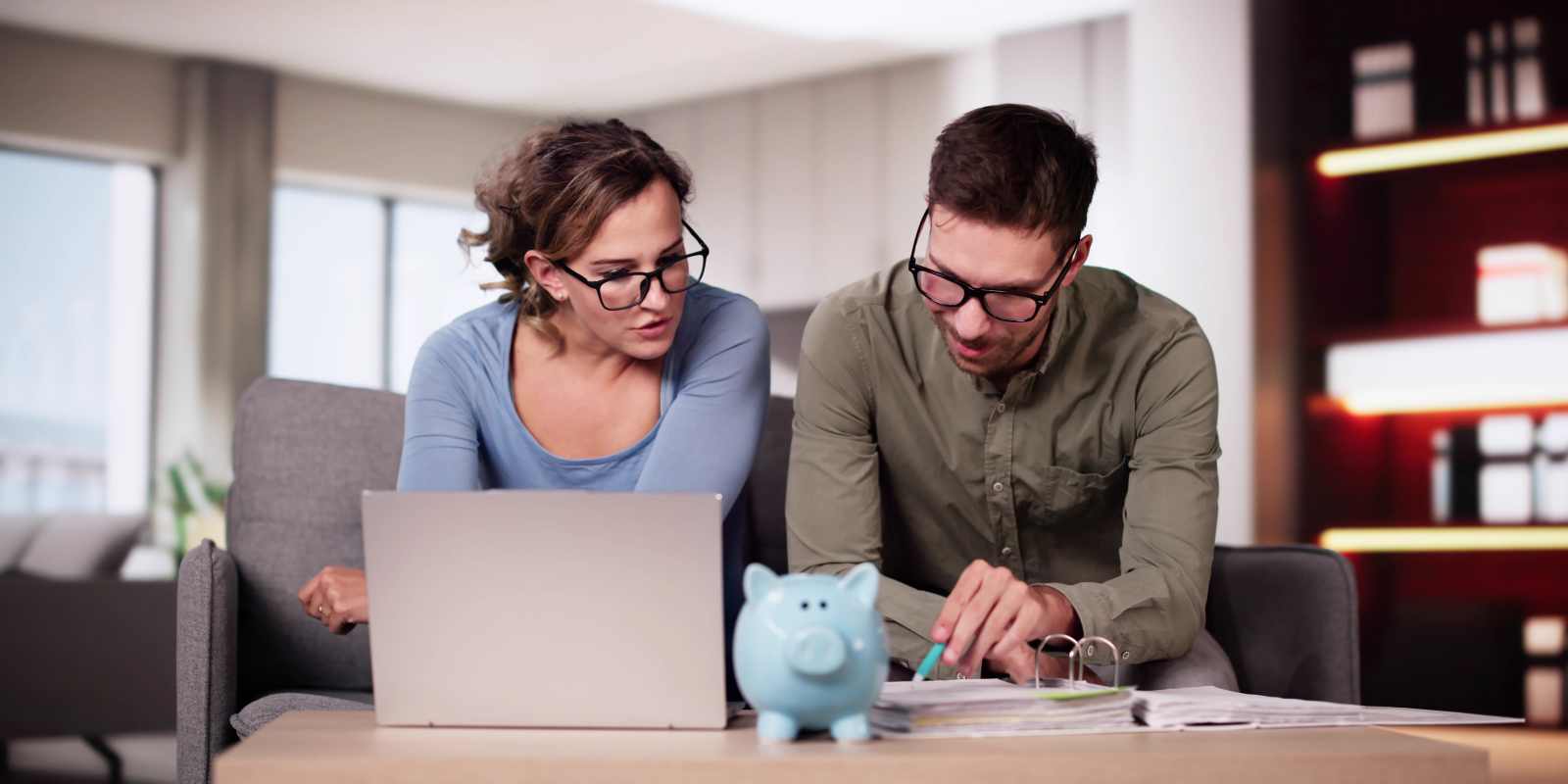 Couple Checking Fixed Annuity vs Employer Sponsored Plans for Retirement